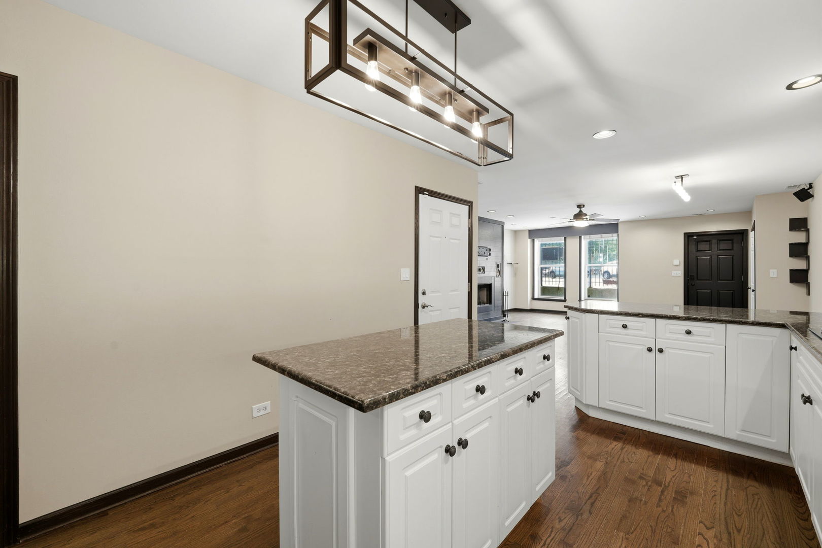 619 North Racine Avenue, Unit 1 Chicago, IL 60642 - Photo 18 of 36 a kitchen with granite countertop a sink and dishwasher