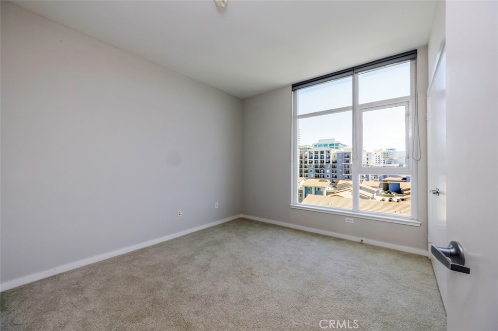 411 West Seaside Way, Unit 703 Long Beach, CA 90802 - Photo 14 of 52 an empty room with windows