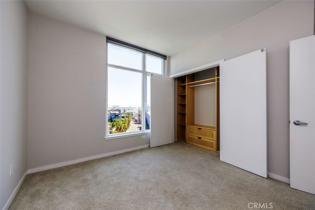 411 West Seaside Way, Unit 703 Long Beach, CA 90802 - Photo 15 of 52 a view of an empty room and window