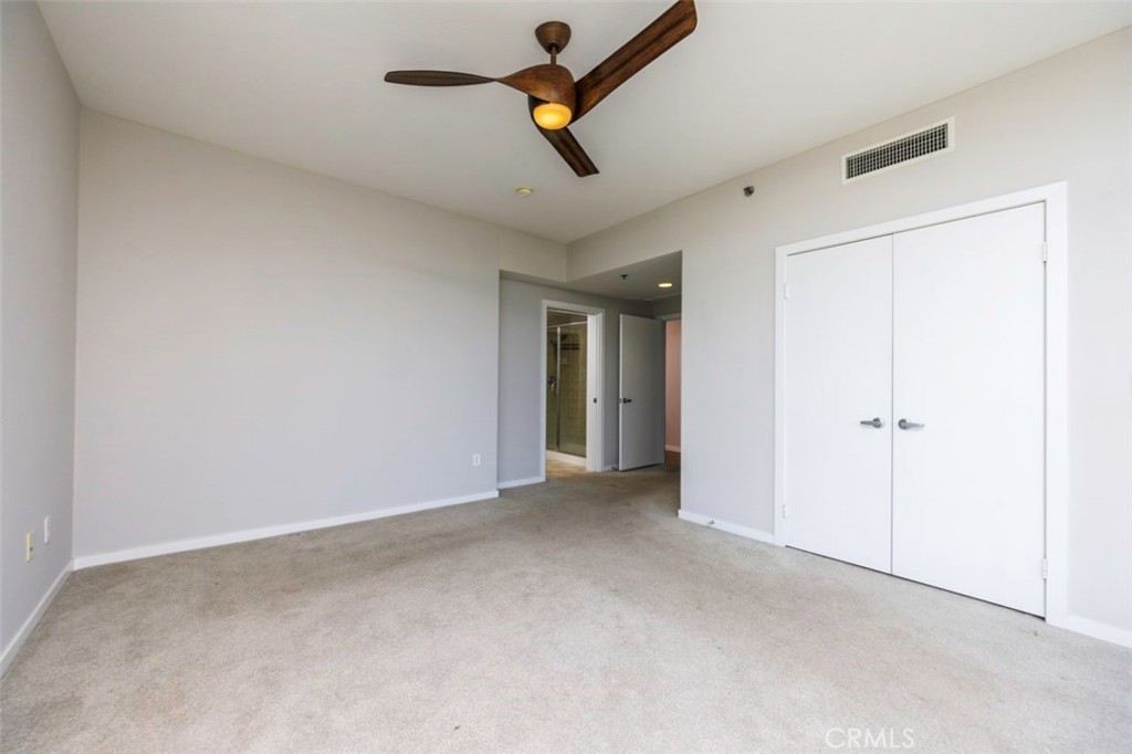411 West Seaside Way, Unit 703 Long Beach, CA 90802 - Photo 20 of 52 a view of empty room with ceiling fan