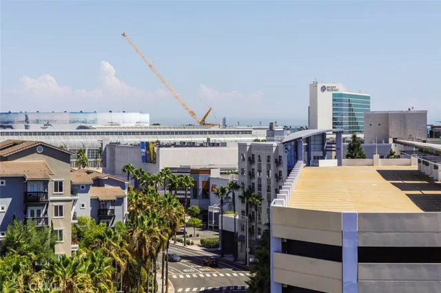 a view of a large building with a roof deck