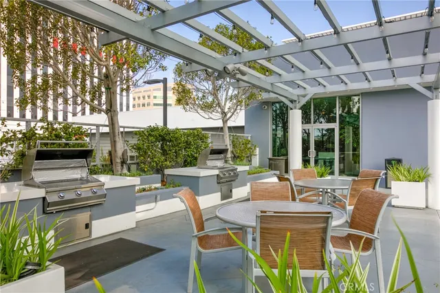 a view of an chairs and tables in the patio