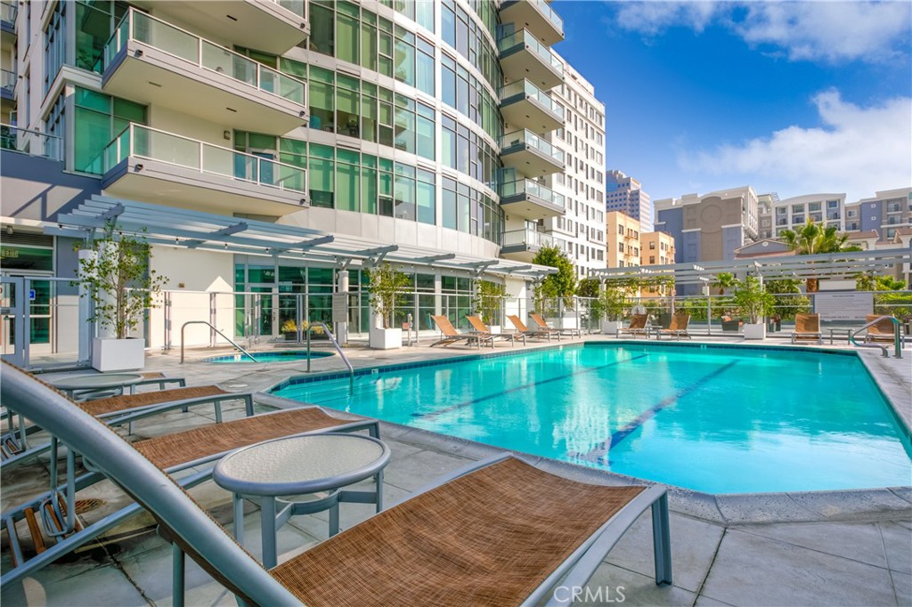 411 West Seaside Way, Unit 703 Long Beach, CA 90802 - Photo 50 of 52 a view of a swimming pool with outdoor seating