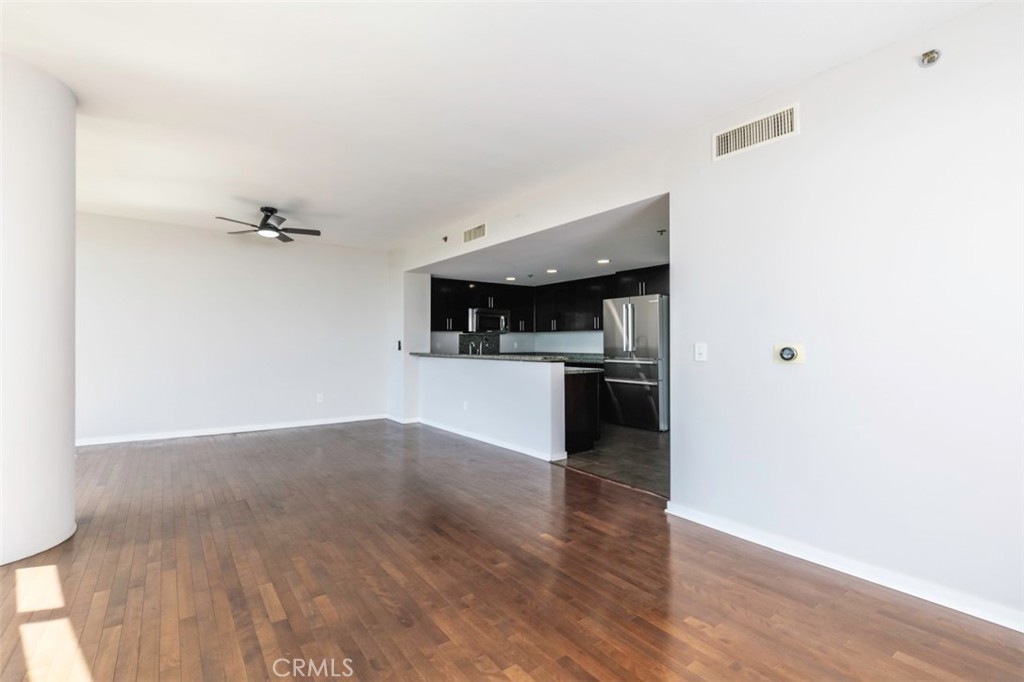 411 West Seaside Way, Unit 703 Long Beach, CA 90802 - Photo 10 of 52 a view of a kitchen from the hallway