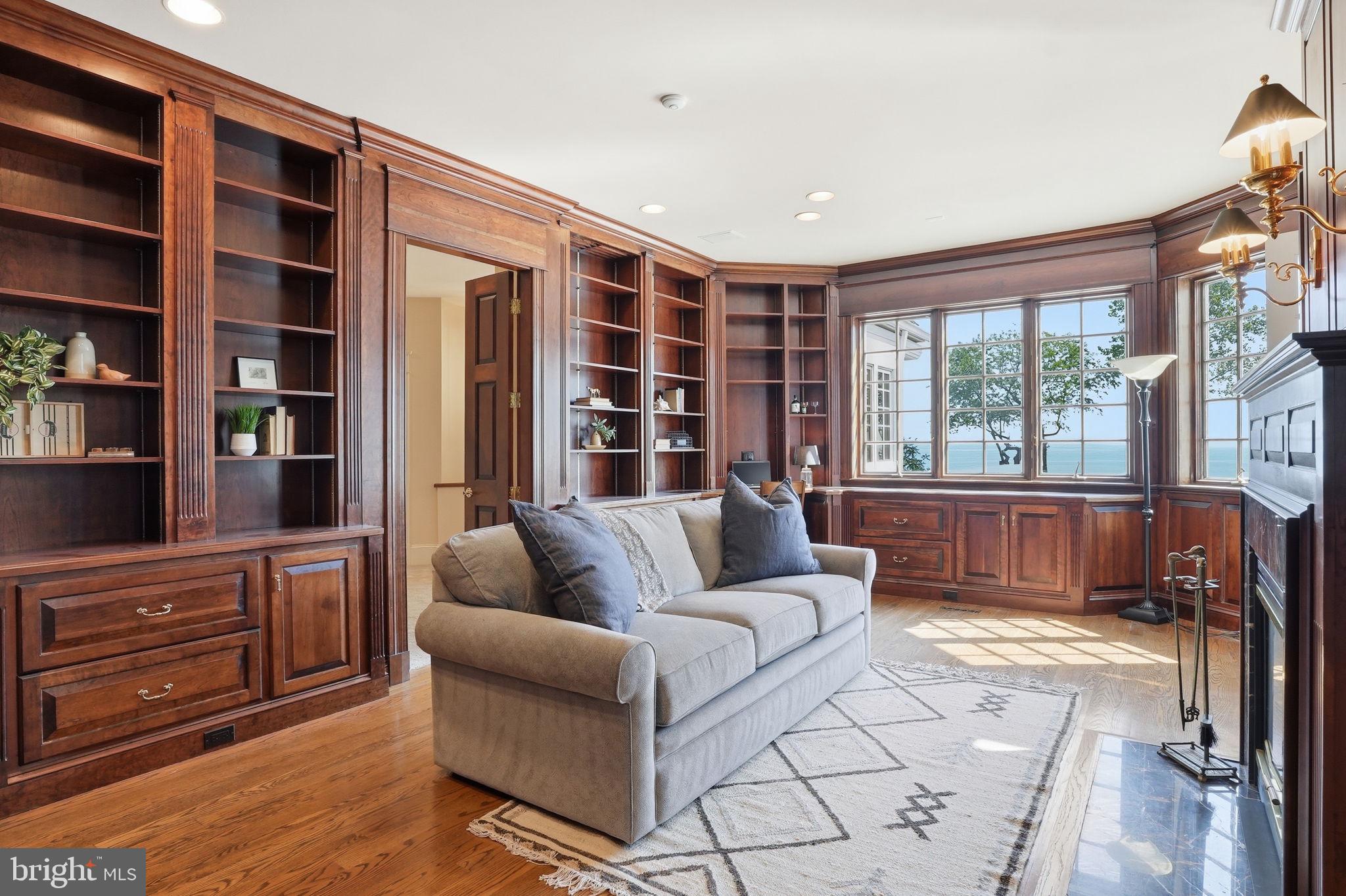 2562 Carrollton Road Annapolis, MD 21403 - Photo 21 of 54 Stunning built ins and dual sided FP with fam. rm