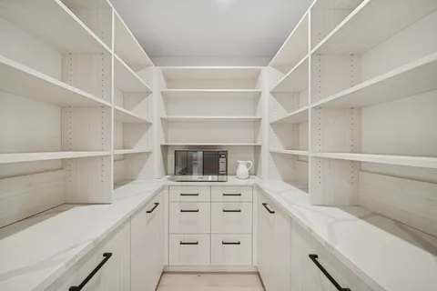 a view of an empty walk in closet