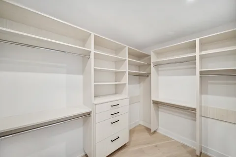 a view of an empty walk in closet
