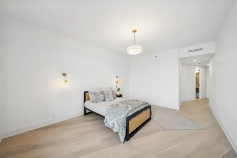 a room with a bed and table