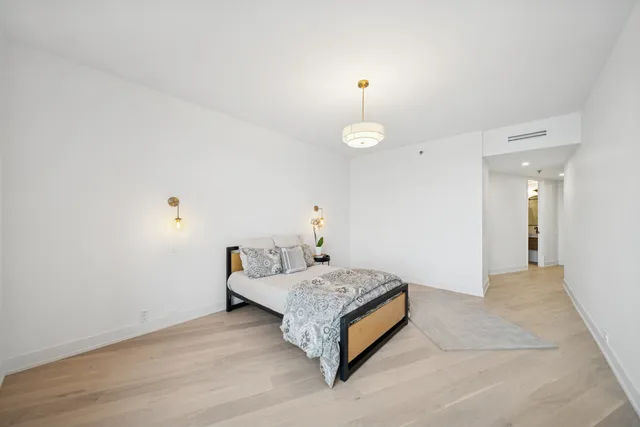 a room with a bed and table