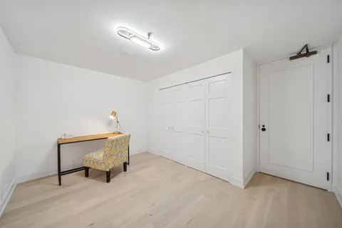 a room with chair and table