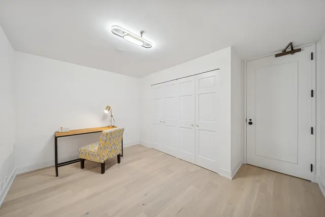 a room with chair and table