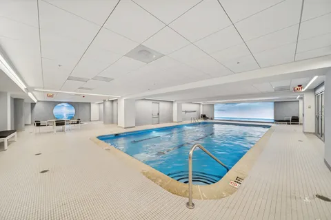a view of a living room and kitchen