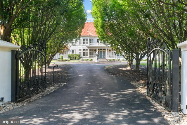 a lobby with furniture and floor to ceiling window