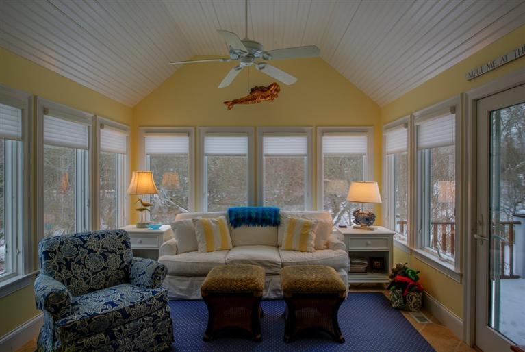 76 Greensward Road Mashpee, MA 02649 - Photo 9 of 24 a living room with furniture and a large window