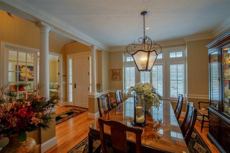 76 Greensward Road Mashpee, MA 02649 - Photo 10 of 24 a view of a dining room with furniture window and wooden floor