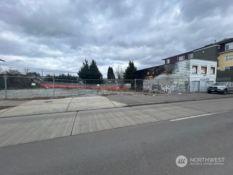 326-330 Northwest 85th Street Seattle, WA 98117 - Photo 7 of 9 a view of building with car parked on road