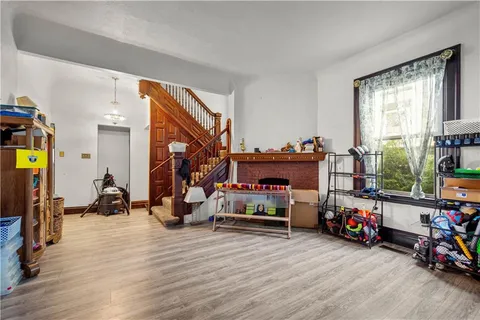 a view of a room with toys and a window
