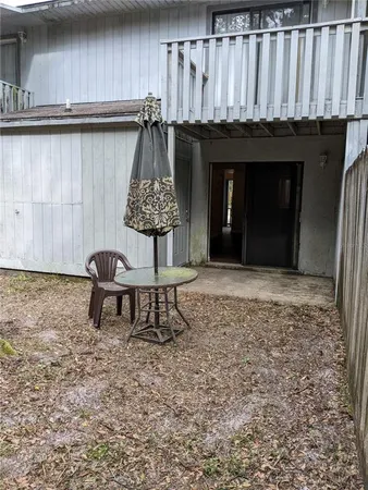 a kitchen with a stove and a table