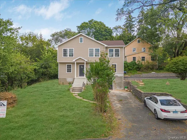a view of a backyard with a garden