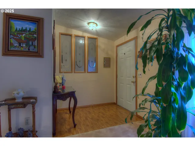 a view of entryway with a front door