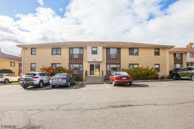 a car parked in front of a house