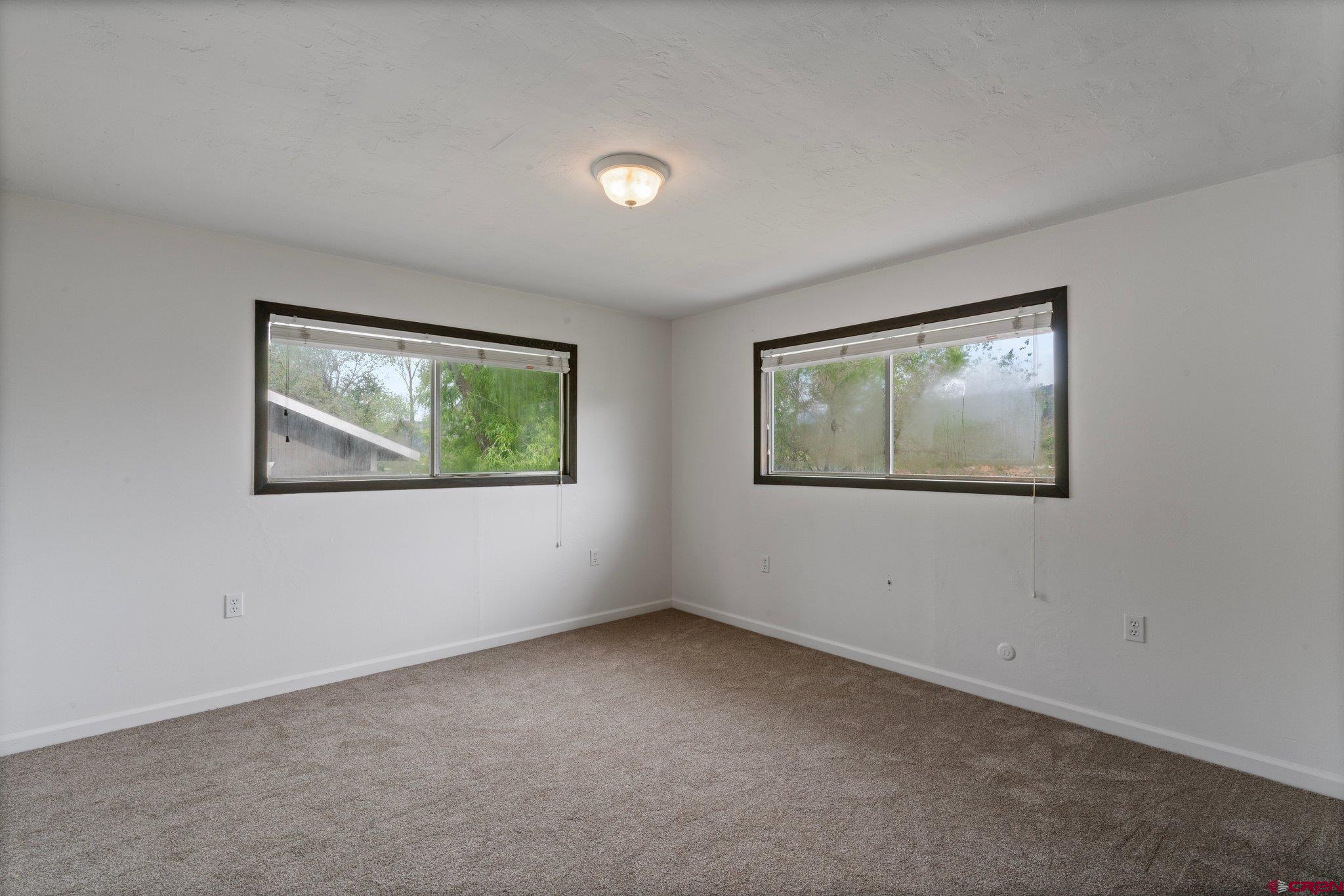 2913 Richard Drive Durango, CO 81301 - Photo 17 of 35 an empty room with windows