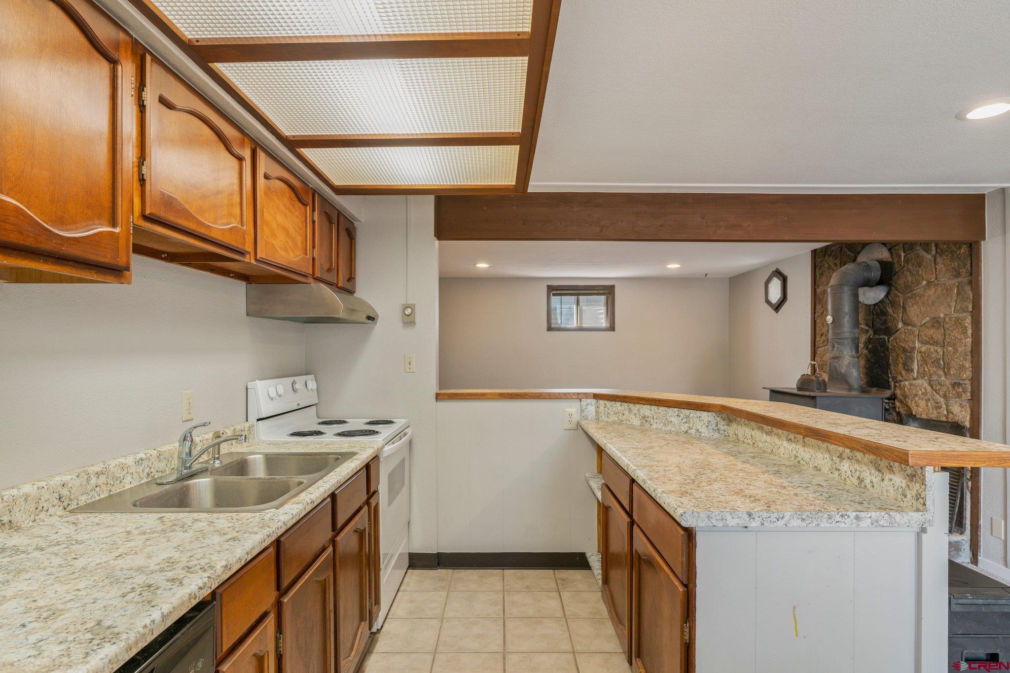 2913 Richard Drive Durango, CO 81301 - Photo 25 of 35 a kitchen with a stove and a sink