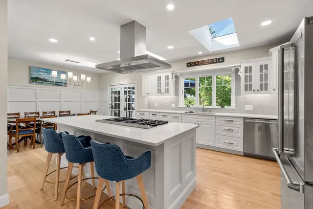 a kitchen with lots of counter top space and appliances
