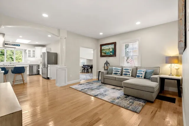 a living room with furniture and a table