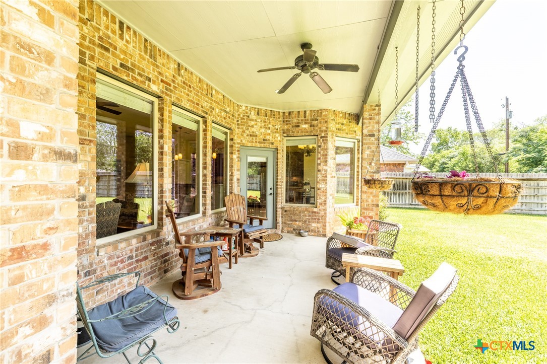 1338 Donovan Street Gonzales, TX 78629 - Photo 20 of 24 a view of a swimming pool with outdoor seating