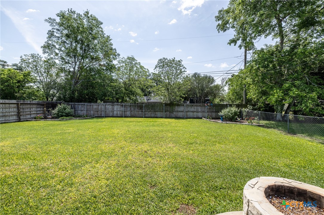 1338 Donovan Street Gonzales, TX 78629 - Photo 21 of 24 a view of yard with swimming pool and seating