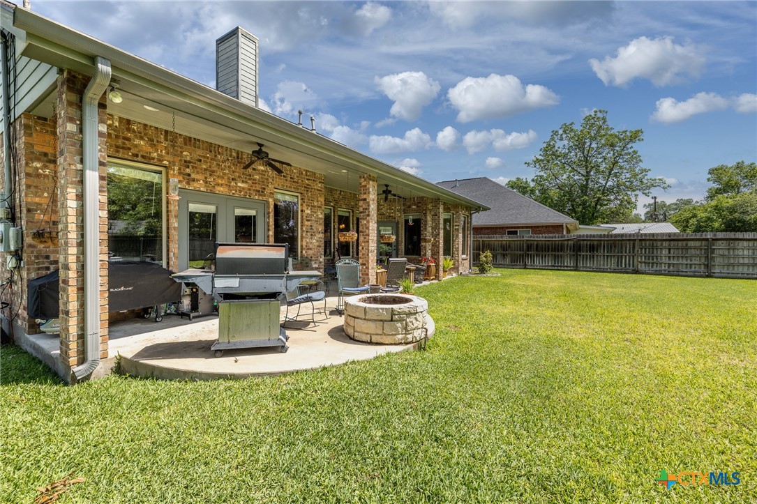 1338 Donovan Street Gonzales, TX 78629 - Photo 22 of 24 a view of a house with swimming pool garden and patio