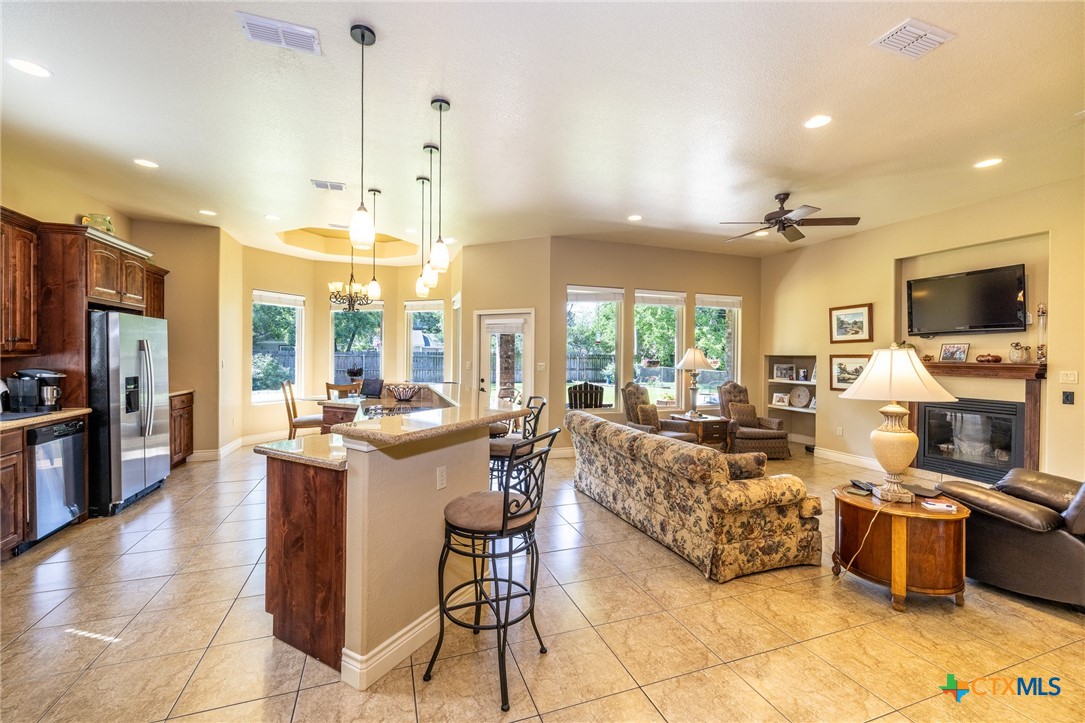 1338 Donovan Street Gonzales, TX 78629 - Photo 3 of 24 a view of a living room kitchen and a large window