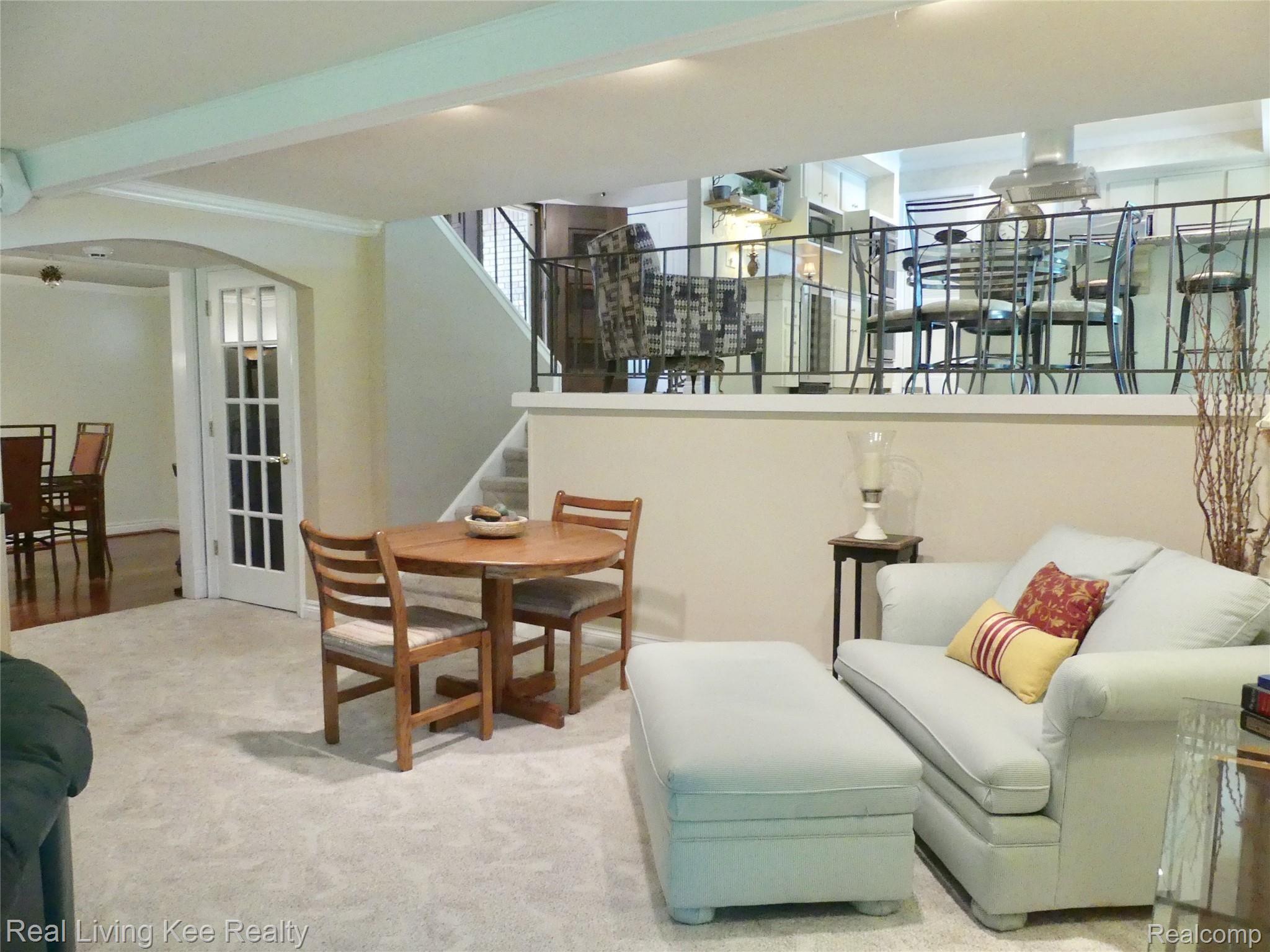 219 Beechview Drive Rochester, MI 48306 - Photo 13 of 64 Family room with stairs to kitchen