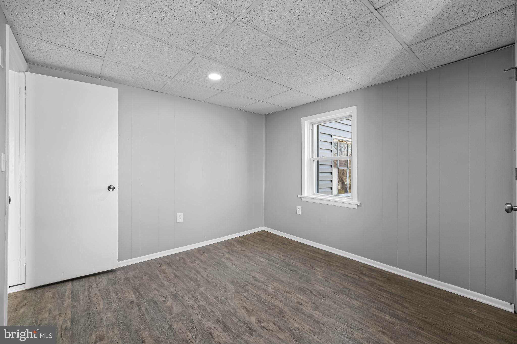 1480 Seven Valleys Road, Unit 2 York, PA 17408 - Photo 14 of 19 a view of a big room with wooden floor and windows