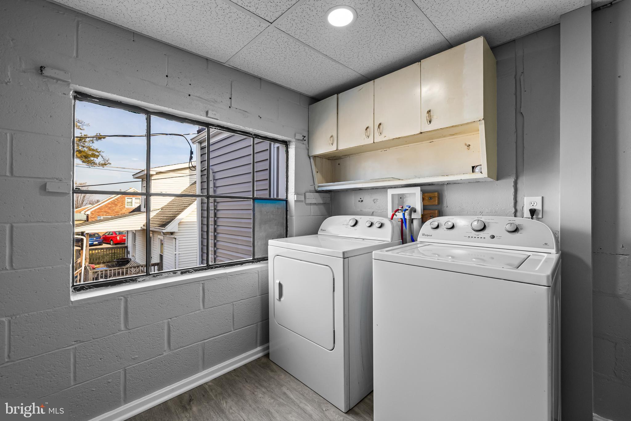 1480 Seven Valleys Road, Unit 2 York, PA 17408 - Photo 16 of 19 a utility room with dryer and washer