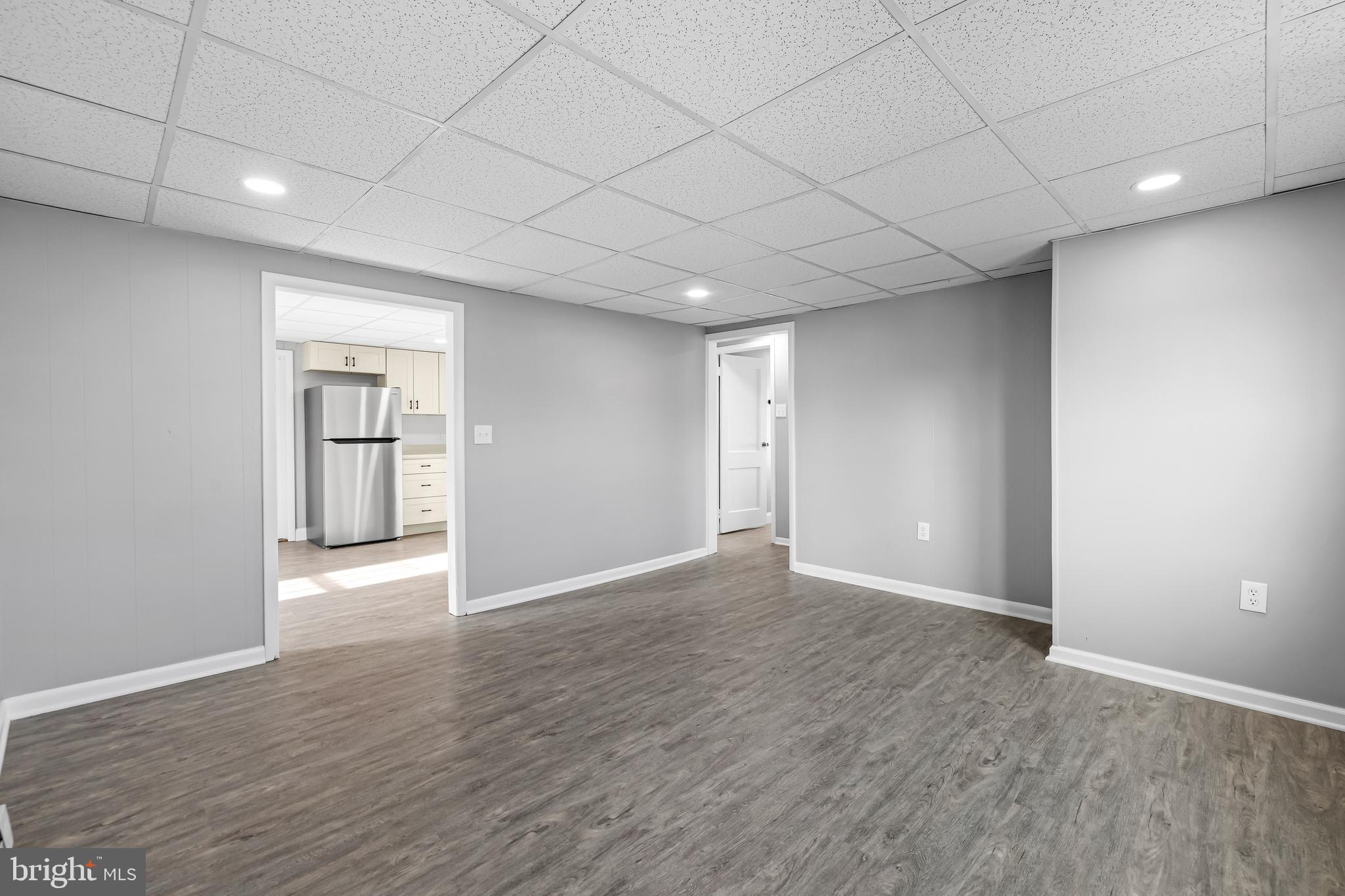1480 Seven Valleys Road, Unit 2 York, PA 17408 - Photo 6 of 19 a view of an empty room with closet and wooden floor