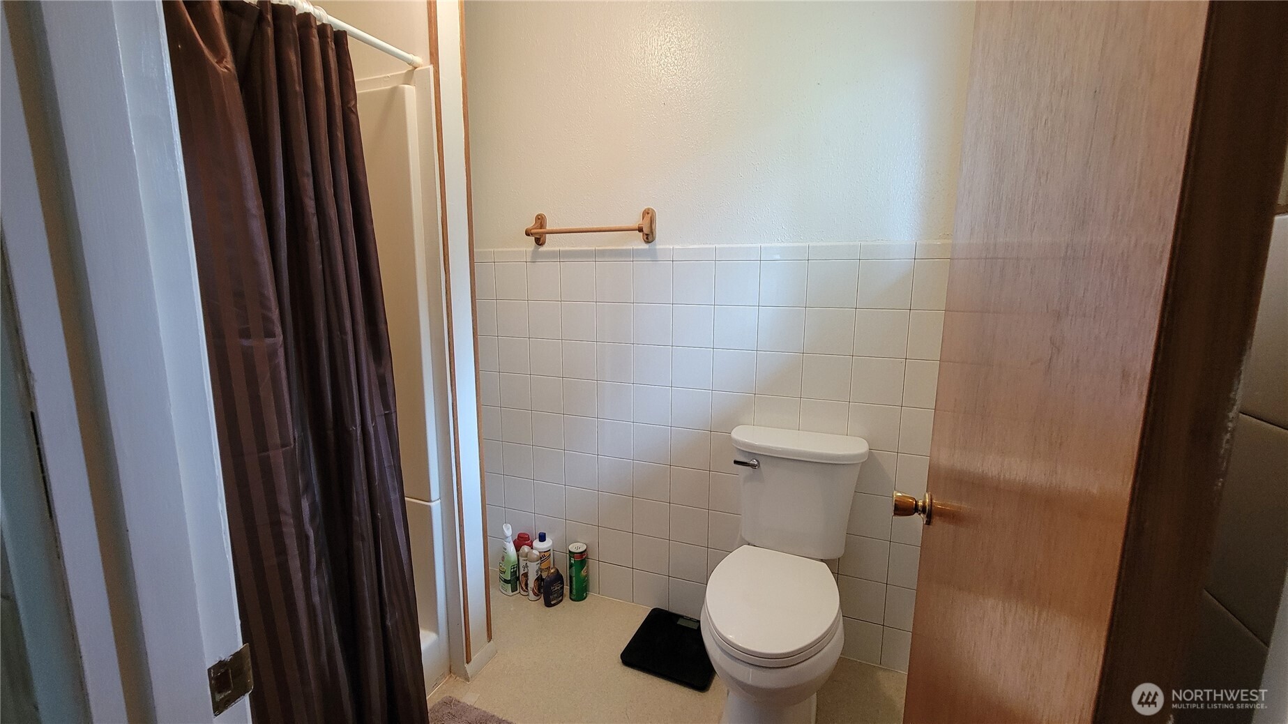 1296 Highway 12 Chehalis, WA 98532 - Photo 15 of 33 a white toilet sitting next to a bathroom sink