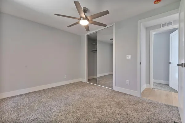 a view of an empty walk in closet