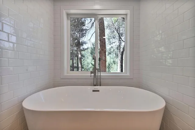 a view of a house with a floor to a yard