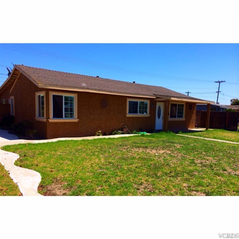 3354 Sycamore Street Oxnard, CA 93033 - Photo 1 of 7 a front view of house with a garden