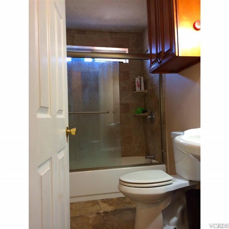 3354 Sycamore Street Oxnard, CA 93033 - Photo 7 of 7 a bathroom with a toilet and a shower