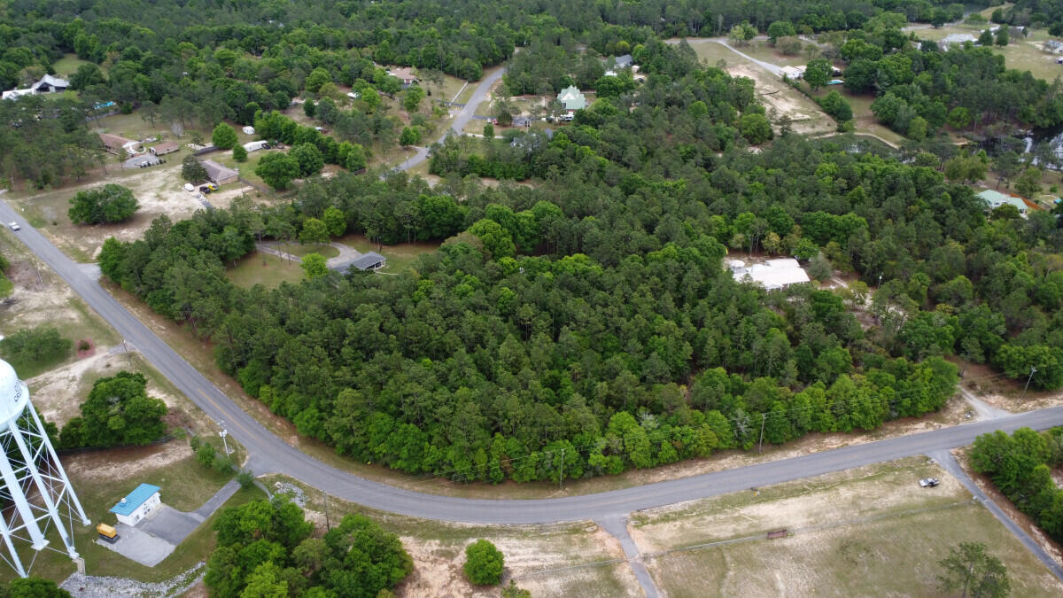 0 Old Bethel Road Crestview, FL 32536 - Photo 3 of 6 an aerial view of a house with a yard and outdoor seating