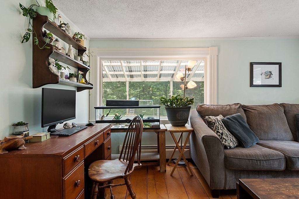 36 West Princeton Road Westminster, MA 01473 - Photo 18 of 42 a workspace with furniture and a flat screen tv