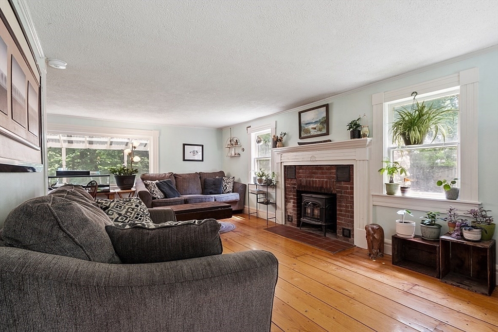 36 West Princeton Road Westminster, MA 01473 - Photo 19 of 42 a living room with furniture and a fireplace