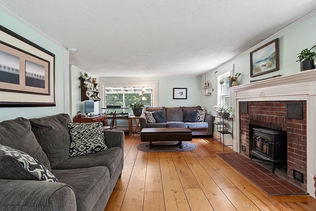 36 West Princeton Road Westminster, MA 01473 - Photo 20 of 42 a living room with furniture and a fireplace