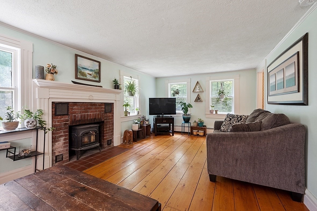36 West Princeton Road Westminster, MA 01473 - Photo 21 of 42 a living room with furniture and a fireplace