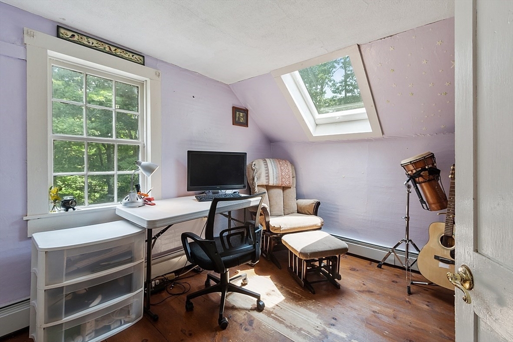 36 West Princeton Road Westminster, MA 01473 - Photo 24 of 42 a view of a workspace with furniture and a window