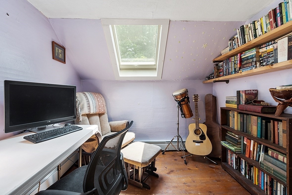 36 West Princeton Road Westminster, MA 01473 - Photo 25 of 42 a view of a workspace with furniture and a bookshelf