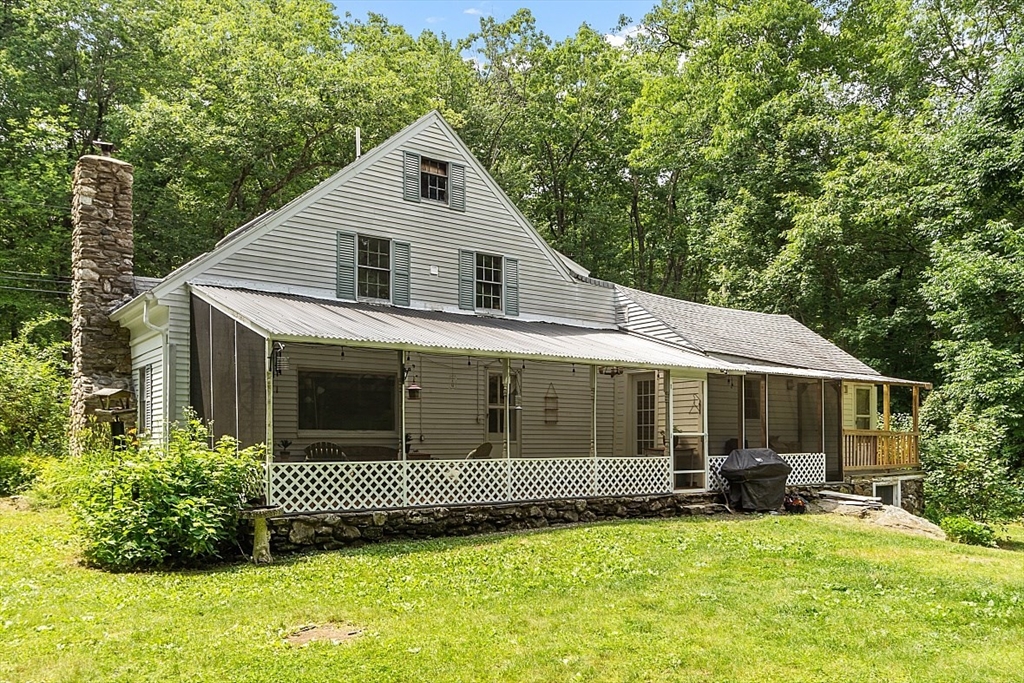 36 West Princeton Road Westminster, MA 01473 - Photo 4 of 42 a front view of a house with a garden